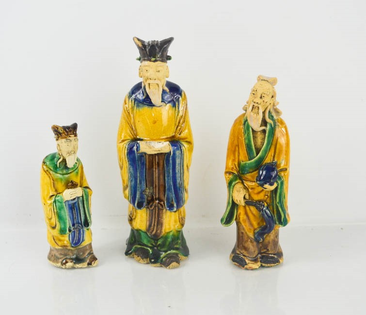 Three Japanese stoneware glazed figurines, early 20th century. [Being sold for our yearly charity