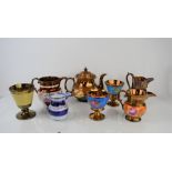 A group of Victorian copper lustreware, to include teapot, jugs, and goblets.