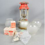 A Bialaddin model 315 lantern, together with a gas light fitting with two glass shades.