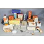 A quantity of vintage chemists accessories and products, to include micro squares, Asthma