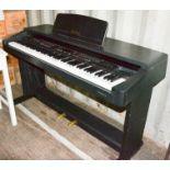 A Technics SX-PR303 electric keyboard / piano and stand