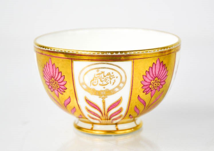 A 19th century Coalport porcelain bowl, decorated with pink stylised flowers bordered with