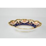 A 19th century Coalport porcelain bowl, of oval form with scalloped edge, cobalt blue ground and