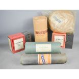 A group of vintage cotton wool and tissue in the original packaging.