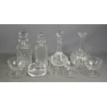 Four cut glass decanters.