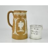 A 19th century mug labelled John R J Burdon, together with a brown Wedgwood Jasperware jug 20m high.
