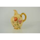 A Royal Worcester blush ivory flat back jug painted with flowers, numbered 1094 to the base, 13cm