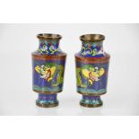A pair of Chinese cloisonne vases, depicting dragons, 9½cm high.