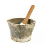 A cast iron pestle and ceramic mortar with wooden handle, 11½cm high.