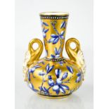 A fine 19th century Coalport porcelain twin handled vase in the Fruit Tree pattern, circa 1970, 11cm