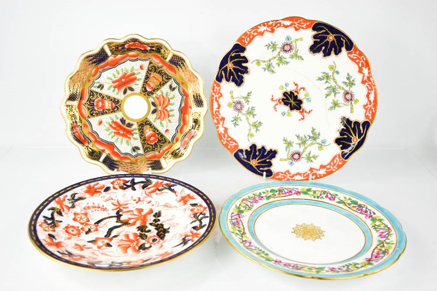Four 19th century Coalport porcelain plates, including one stamped John Mortlock Oxford Street,