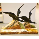 Large French Art Deco mantle piece of two flying geese on marble and alabaster base.