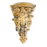 A Victorian plasterwork corbel, in the form of a goats head, and grape & vine decoration, 20cm.
