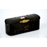 A Georgian papier-mâché faux tortoiseshell toothpick box of elongated oval form with gilt clasp