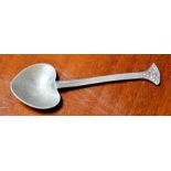 An Arts and Crafts pewter spoon, by John H Green of the Artificers Guild, c.1920-30, the spoon