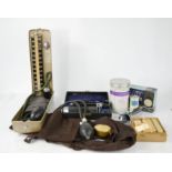 A boxed otoscope by Allen and Hanbury, a blood pressure monitor, an aneroid sphygmomanometer, and