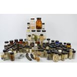 A large group of various bottled herbs and spices, to include manna, dill, soya and others.