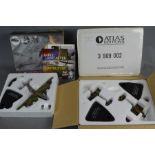 Three boxed Atlas editions diecast models of Lancaster , spitfire , Hurricane and Junker