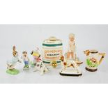 A Royal Albert Peter Rabbit, a Wade miniature Sherry barrel, a porcelain spaniel, and various