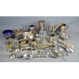 A quantity of silver plate to include cutlery, jugs , inkwell, candle holders etc