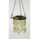 An Art Nouveau early 20th century French hanging light shade, the green and white glass beads of