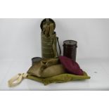 A German post war gas mask tin and mask together with an Australian military Akubra hat and a
