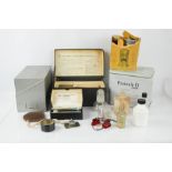 A group of vintage chemists collectables, to include The Householders First Aid Case as