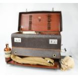 A 1940s midwifery / obstetrics bag, complete with original contents, to include medicine bottles,