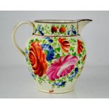 A Victorian Creamware Sunderland jugs; hand painted and depicting flowers, 20cm high.