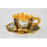A rare and fine 19th century Coalport porcelain demitasse cup and saucer, with cobalt blue ground,