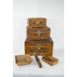 A group of treen to include three graduated Chinese carved boxes.