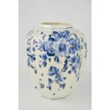 A blue and white 20th century Delft vase, depicting flowers, 26cm high.