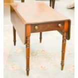 A 19th century mahogany drop leaf table, with single drawer, 69 by 100 by 90cm.