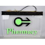 A glass pharmacy sign, electric, 61 by 36cm.