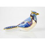 A Royal Crown Derby bone china bird numbered LIX, 9cm high.