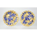 A 19th century pair of Coalport porcelain plates in the Blue Swallows pattern circa 1875, 23cm