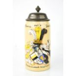 A German antique Stein, dated 1900, inscribed to the pewter lid, and hand painted with crest to