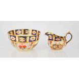 A Royal Crown Derby bowl. milk jug and an Abbeydale Chrysanthemum pattern jug.