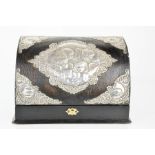 A 19th century envelope stationary box with applied silver plaques embossed with winged cherubs,