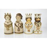 Four studio ware King and Queen figures.