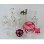 A group of crystal and glass decanters together with Bohemia crystal bowls, pewter rimmed jug etc