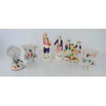 A group of 19th century Staffordshire flatback figures and posy vases