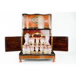 A fine 19th century French burr walnut, ebony and boule work decanter and glasses box, inlaid with