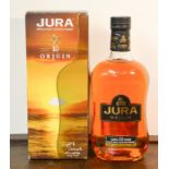 A bottle of Jura Single Malt Scotch Whisky, aged 10 years, origin, in original box.