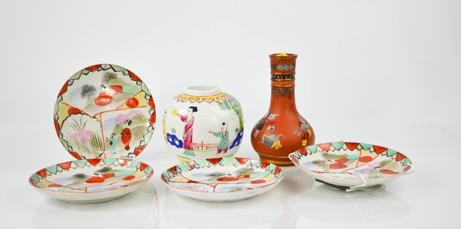 Four Chinese porcelain dishes, a stoneware bottle vase and a ginger jar.