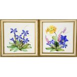 A pair of hand painted tiles, signed and depicting flowers, 11 by 10cm.