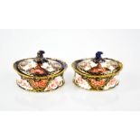 A pair of Royal Crown Derby trinket dishes with covers.