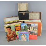 A quantity of LPs and singles to include 'Phantom of the Opera', Elvis Presley, Abba etc