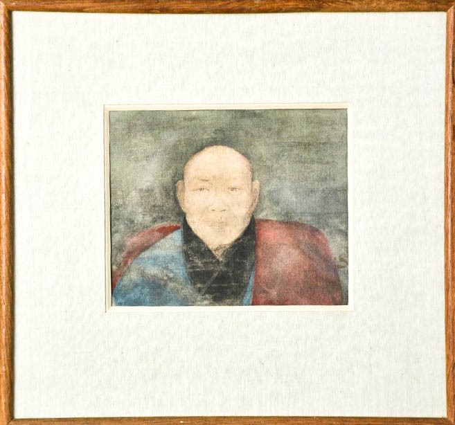 A Tibetan gouache on silk, painted with a portrait of a monk.
