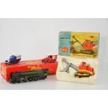 A boxed Tri-ang locomotive and a boxed Corgi priestman "cub" shovel 1128